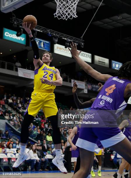Travis Wear of the South Bay Lakers drives on Moses Brown of the Texas Legends in the first quarter on January 04, 2020 at Comerica Center in Frisco,...