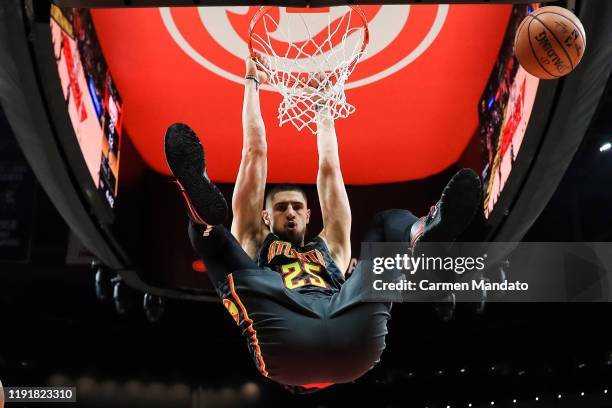 Alex Len of the Atlanta Hawks dunks the ball during the first quarter of a game against the Indiana Pacers at State Farm Arena on January 4, 2020 in...