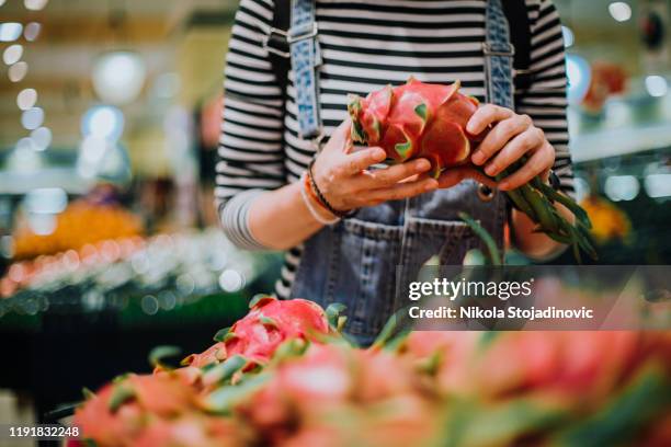 grocery shopping - dragon fruit stock pictures, royalty-free photos & images