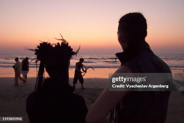 arambol beach late at night, music and dance, deep twilight hour - goa nightlife stock pictures, royalty-free photos & images