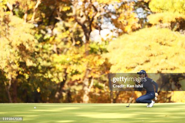 Shin-Ae Ahn of South Korea lines up a putt on the 15th hole during the second round of the Japanese LPGA Final Qualifying Tournament at Kodama Golf...