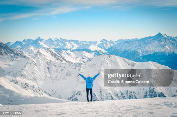 young woman hiking at pointe helbronner, mont blanc - courmayeur stock pictures, royalty-free photos & images