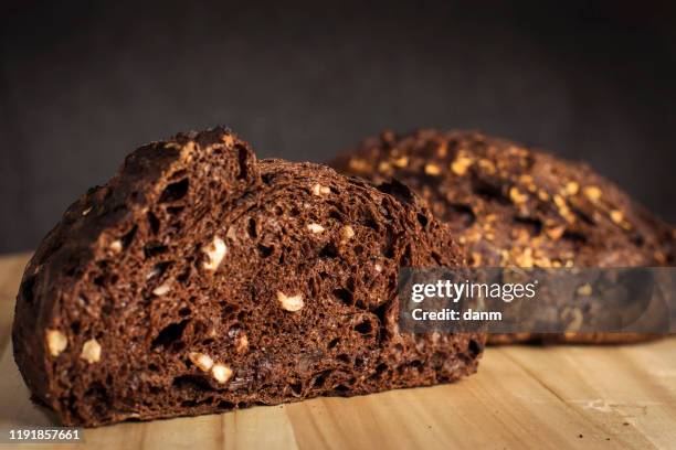 home bread made from chocolate and nuts - plum stock pictures, royalty-free photos & images