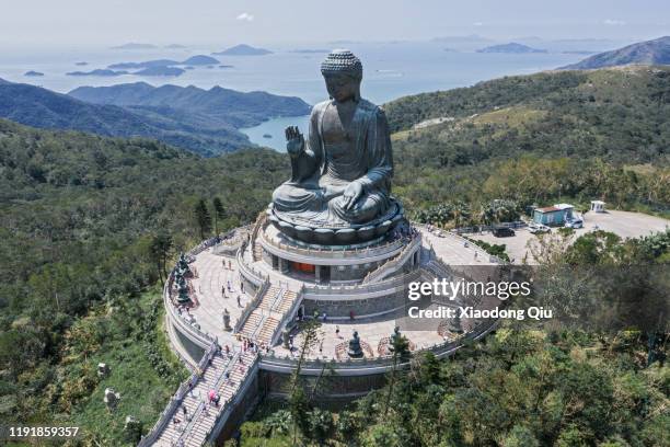 hong kong tian tan buddha at dusk - lantau stock pictures, royalty-free photos & images