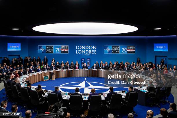 Leaders listen to UK Prime Minister Boris Johnson while attending their summit at the Grove Hotel on December 4, 2019 in Watford, England. France and...