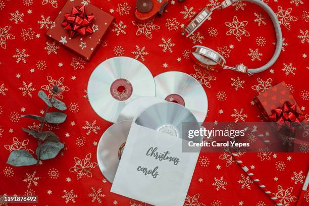 xmas items with music cd cassette - christmas music stock pictures, royalty-free photos & images