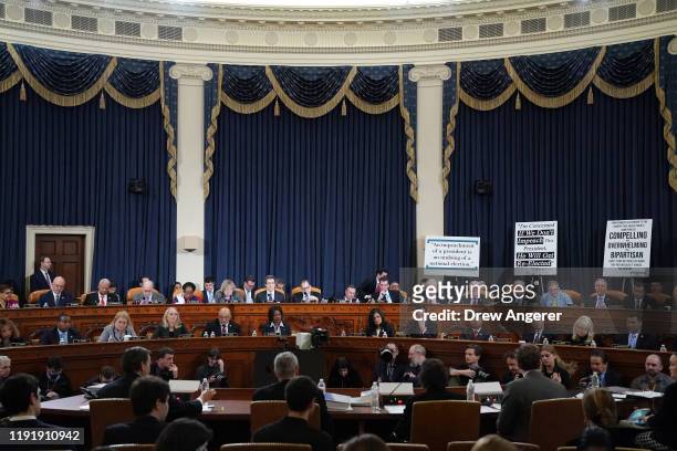 Members of the House Judiciary Committee listen as constitutional scholars testify before the House Judiciary Committee in the Longworth House Office...