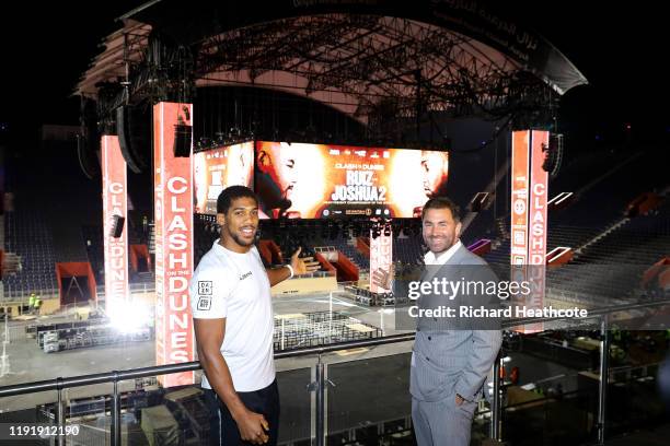 Anthony Joshua and Eddie Hearn pose for a photo inside the Diriyah Arena during the Clash On The Dunes Press Conference at the Diriyah Arena on...