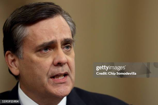 Constitutional scholar Jonathan Turley of George Washington University testifies before the House Judiciary Committee in the Longworth House Office...