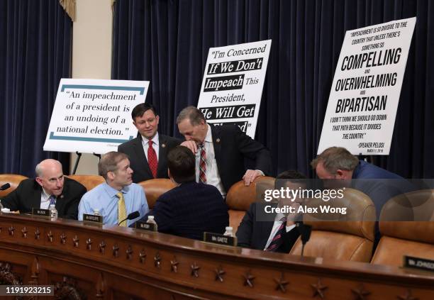 Rep. Rep. Louie Gohmert , Rep. Jim Jordan , Rep. Matt Gaetz , Rep. Mike Johnson , Rep. Andy Biggs and Rep. John Ratcliffe confer during a break as...