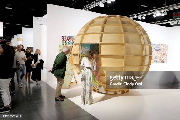 Guests attend the Art Basel Miami Beach VIP Preview 2019 at Miami Beach Convention Center on December 04, 2019 in Miami Beach, Florida.