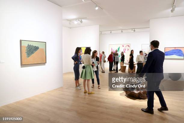 Guests attend the Art Basel Miami Beach VIP Preview 2019 at Miami Beach Convention Center on December 04, 2019 in Miami Beach, Florida.