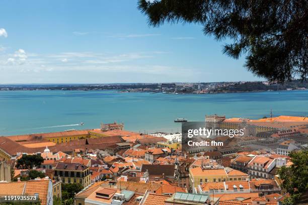 lisbon old town with praça do comércio (portugal) - comercio stock pictures, royalty-free photos & images