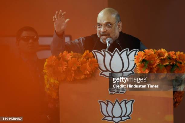 Home Minister Amit Shah addressing Bharatiya Janata Party's booth-level workers rally at Indira Gandhi Indoor Stadium, on January 5, 2020 in New...