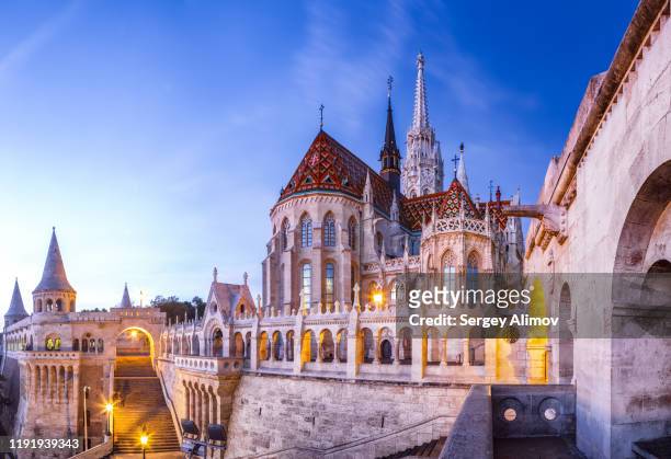 fisherman's bastion and matthias church view at morning dawn - budapest stock pictures, royalty-free photos & images