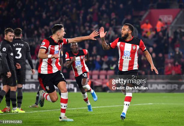 Ryan Bertrand of Southampton celebrates with teammate Jan Bednarek after scoring his team's second goal during the Premier League match between...