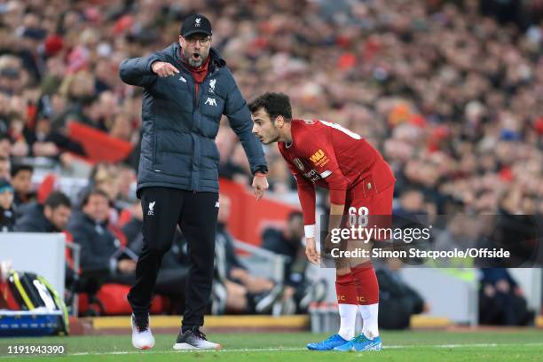 Liverpool manager Jurgen Klopp issues instructions to Pedro Chirivella of Liverpool during the FA Cup Third Round match between Liverpool and Everton...