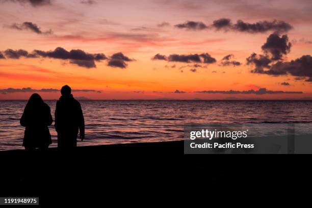 Shadows on the sea at sunset on a cold winter day, inside the Maremma Regional Park, in Tuscany, Italy.