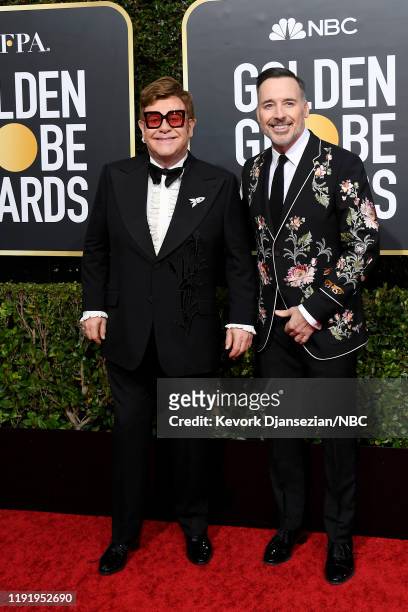 77th ANNUAL GOLDEN GLOBE AWARDS -- Pictured: Elton John and David Furnish arrive to the 77th Annual Golden Globe Awards held at the Beverly Hilton...