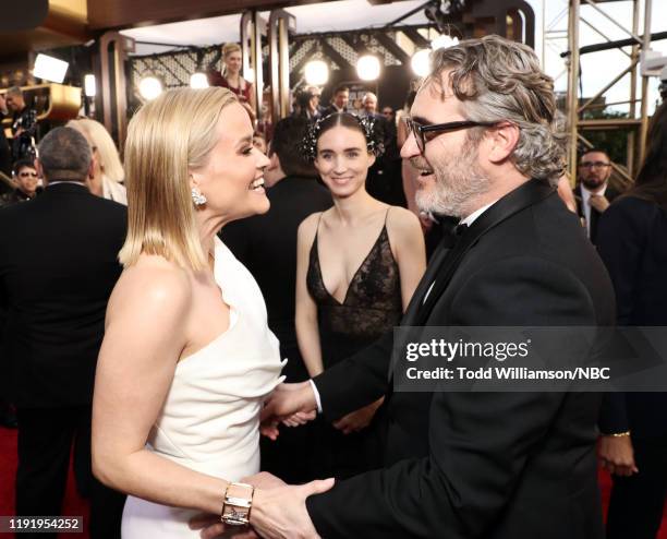 77th ANNUAL GOLDEN GLOBE AWARDS -- Pictured: Reese Witherspoon, Rooney Mara, and Joaquin Phoenix arrive to the 77th Annual Golden Globe Awards held...