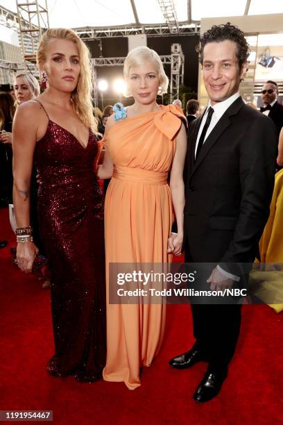 77th ANNUAL GOLDEN GLOBE AWARDS -- Pictured: Busy Philipps, Michelle Williams, and Thomas Kail arrive to the 77th Annual Golden Globe Awards held at...