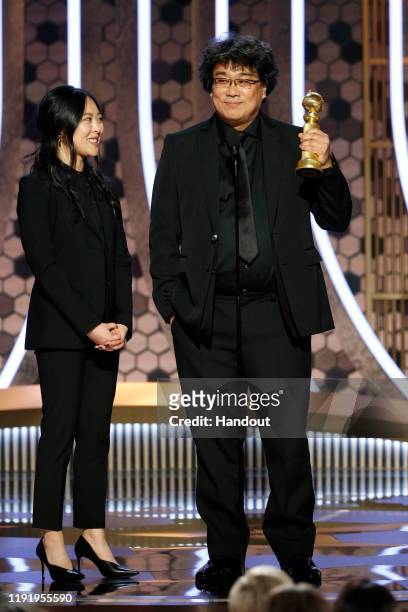 In this handout photo provided by NBCUniversal Media, LLC, Bong Joon Ho, with interpreter/translator, accepts the award for BEST MOTION PICTURE -...