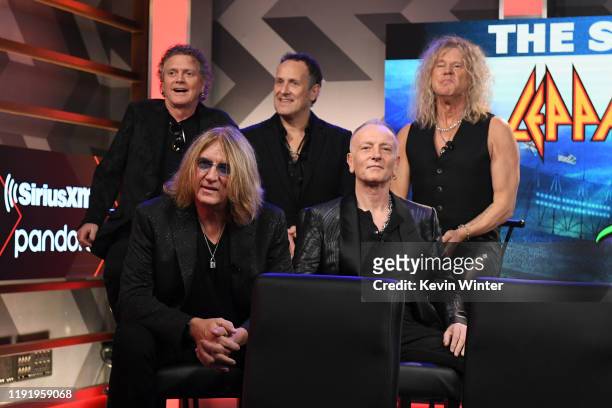 Rick Allen, Joe Elliott, Vivian Campbell, Phil Collen, and Rick Savage of Def Leppard attend the Press Conference with Mötley Crüe, Def Leppard, and...