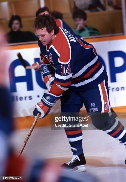 Craig MacTavish of the Edmonton Oilers skates against the Toronto Maple Leafs during NHL game action on February 16, 1991 at Maple Leaf Gardens in...
