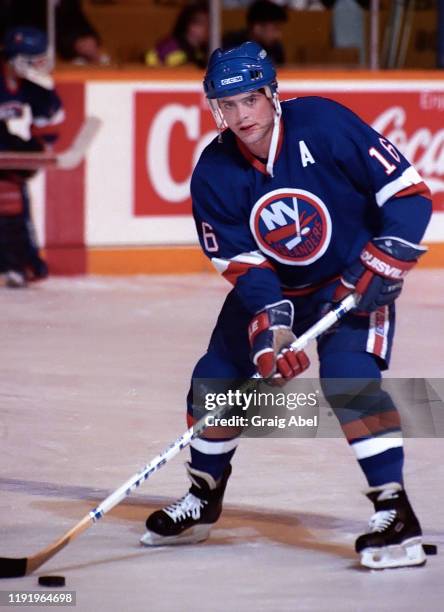 Pat LaFontaine of the New York Islanders skates against the Toronto Maple Leafs during NHL game action on February 9, 1991 at Maple Leaf Gardens in...