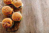 Delicious slider-burgers on dining table
