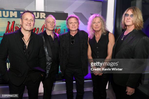 Vivian Campbell, Phil Collen, Rick Allen, Rick Savage, and Joe Elliott of Def Leppard attend the Press Conference with Mötley Crüe, Def Leppard, and...