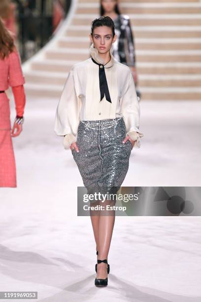 Model walks the runway during the Chanel Metiers d'art 2019-2020 show at Le Grand Palais on December 4, 2019 in Paris, France.