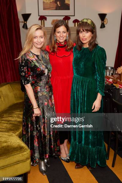 Emma Elwick Bates, Serena Hood and Isabel Spearman attend Collagerie x Strathberry dinner on December 04, 2019 in London, England.