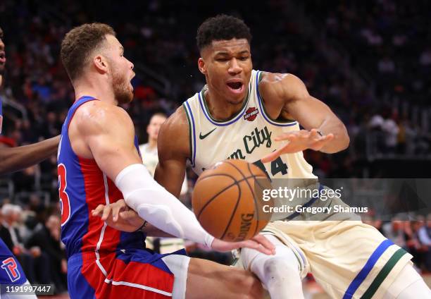 Giannis Antetokounmpo of the Milwaukee Bucks drives to the basket against Blake Griffin of the Detroit Pistons during the second half at Little...