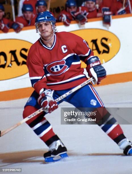 Guy Carbonneau of the Montreal Canadiens skates against the Toronto Maple Leafs during NHL game action on December 12, 1990 at Maple Leaf Gardens in...