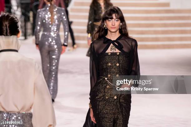 Models walk the runway during the Chanel Metiers d'Art 2019-2020 show at Le Grand Palais on December 04, 2019 in Paris, France.