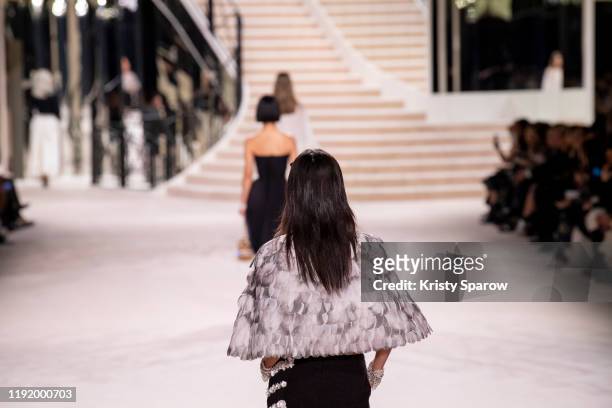 Models walk the runway during the Chanel Metiers d'Art 2019-2020 show at Le Grand Palais on December 04, 2019 in Paris, France.
