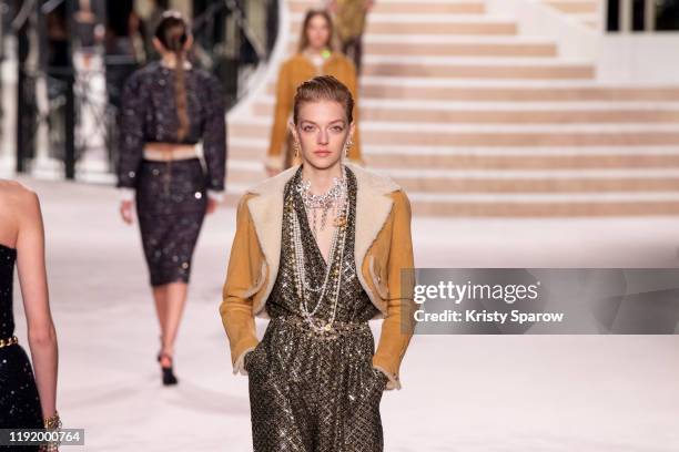 Models walk the runway during the Chanel Metiers d'Art 2019-2020 show at Le Grand Palais on December 04, 2019 in Paris, France.