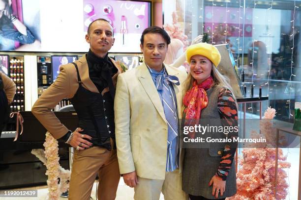 José Osorio, Victor de Souza and Claudia Nuñez during the COS BAR & VICTOR dE SOUZA'S Cirque Du Holidays Toy Drive at Cos Bar Brookfield Place on...