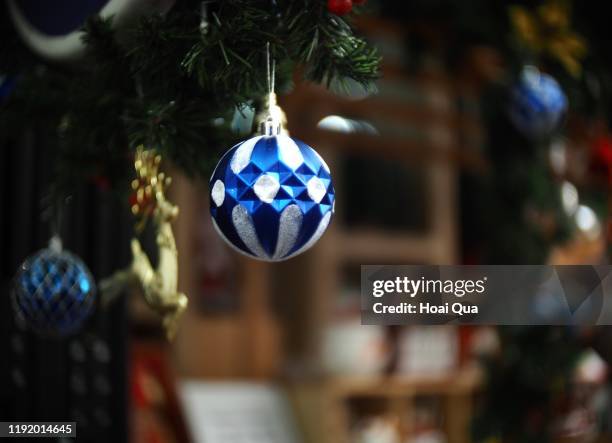 christmas decorations - ball on a table stock-fotos und bilder