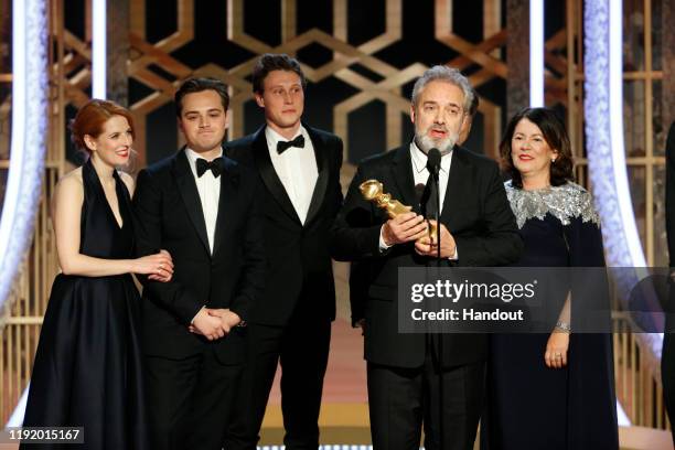 In this handout photo provided by NBCUniversal Media, LLC, Sam Mendes accepts the award for BEST MOTION PICTURE - DRAMA for "1917" onstage, with...