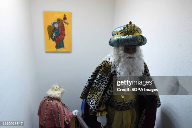 Performers dressed as aspar King, and Melchor King are seen during the Cabalgata de Reyes or the Three Kings parade at the Spanish village of Rebollo...