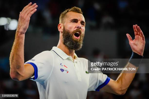 Benoit Paire of France celebrates his victory against Dusan Lajovic of Serbia during their men's singles match on day four of the ATP Cup tennis...