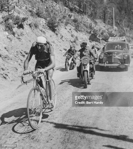 Italian rider Fausto Coppi competing in the Tour de France, July 1951. Coppi finished the tour in 10th place overall. Original publication: Picture...