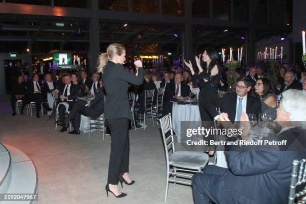 Tony Scotti, Sylvie Vartan, Marc-Antoine Jamet, Marie Drucker, Agathe Lecaron and guests watch Julien Clerc performing during the Gala evening of the...