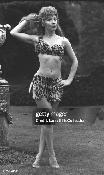 English actress Jacki Piper poses in a leopardskin bikini as June, in a publicity still for the film 'Carry On Up The Jungle', 1970.