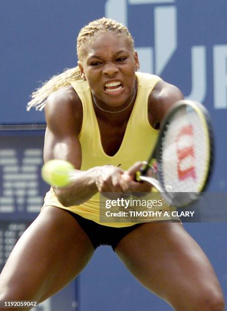 Tenth seed Serena Williams of the US returns the volley to Martina Sucha of Slovakia during their third round match at the US Open in Flushing...