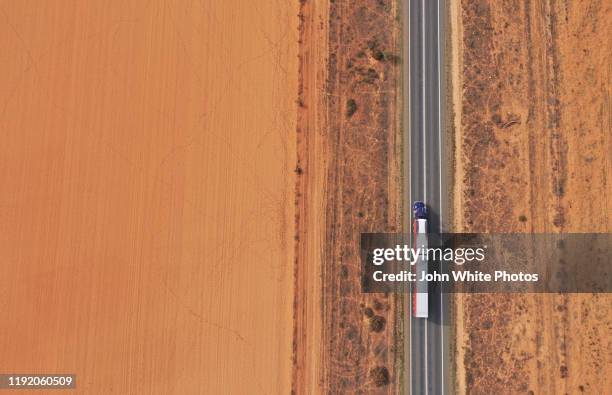 aerial image of a truck on the sturt highway. drought conditions. west of the regional city of mildura. - bush stockfoto's en -beelden