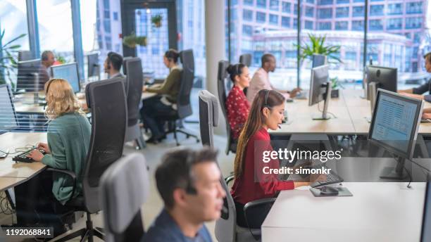 customer service representative working in call centre - outsourcing stock pictures, royalty-free photos & images