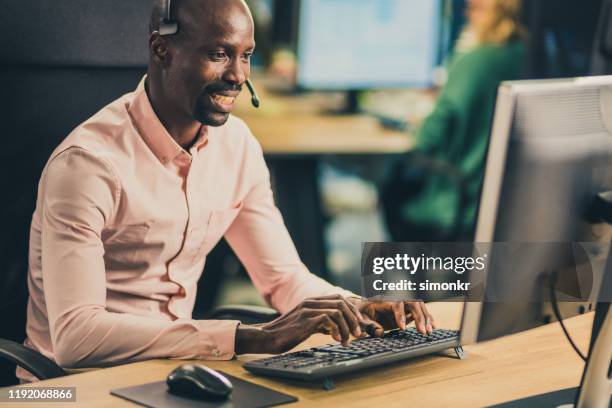 customer service representative working in call centre - hairless mouse stock pictures, royalty-free photos & images
